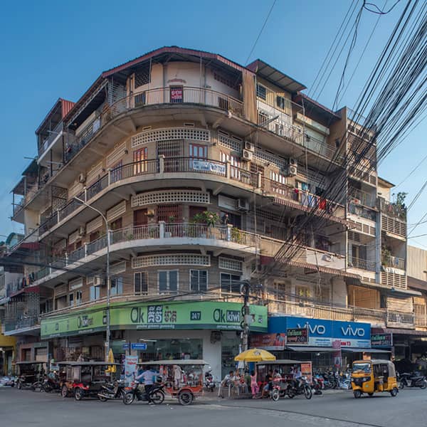 a nice old building at the corner of the street