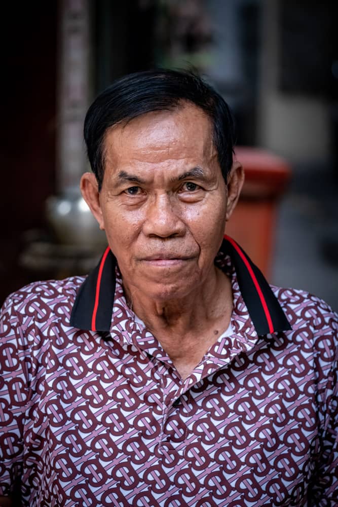 Sitting on the table Phnom Penh street Photo Tour